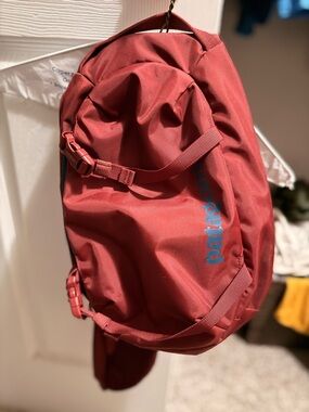 Patagonia Maroon sling Bag with phone pocket